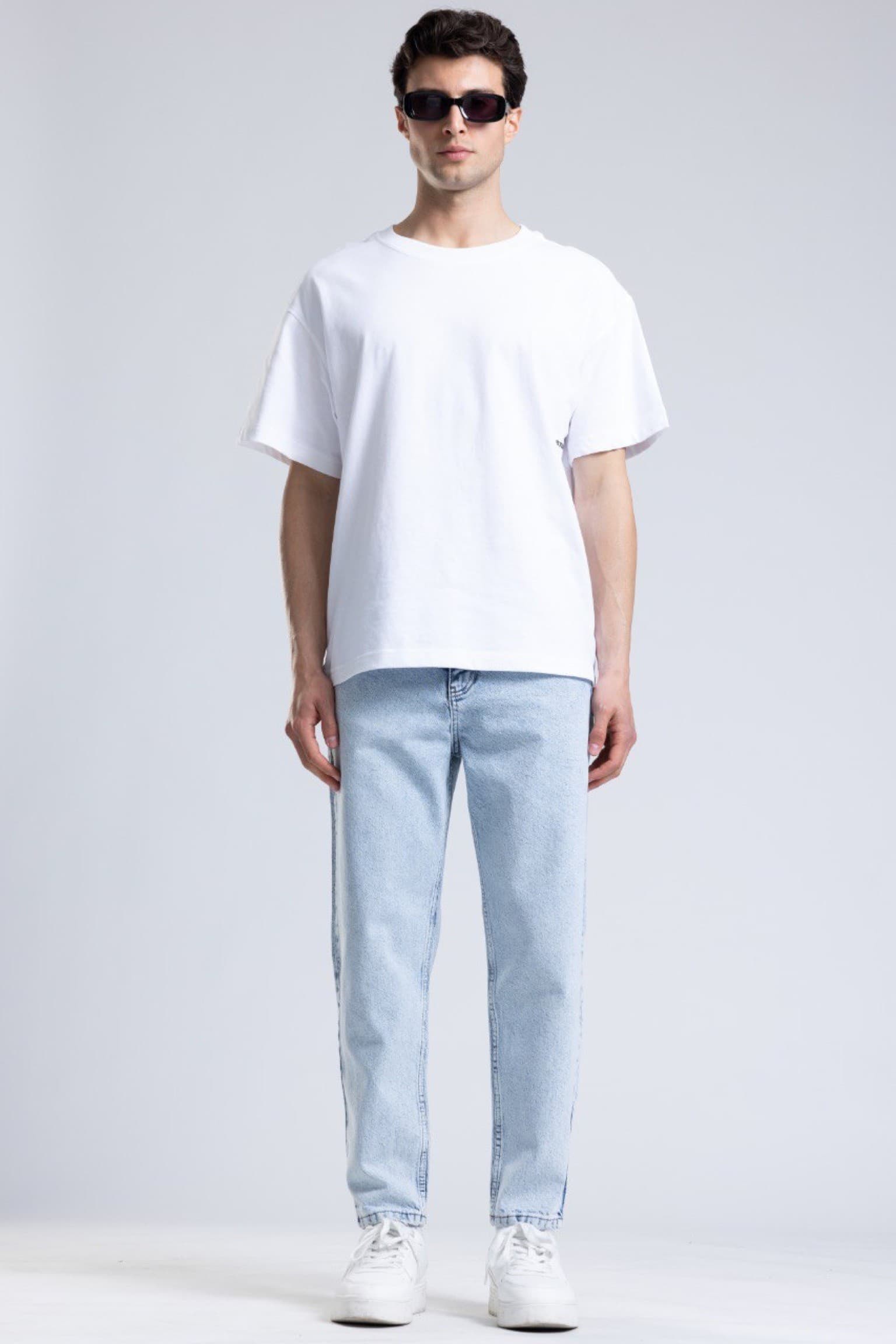 Lightblue Wash Denim Boyfriend Jeans - Light wash denim jeans featuring a clean straight-leg fit with a relaxed everyday silhouette. Designed with a classic five-pocket style, soft faded finish, and comfortable mid-rise waist for effortless wear. Easy to style with tees, hoodies, or sneakers for a fresh modern casual look.