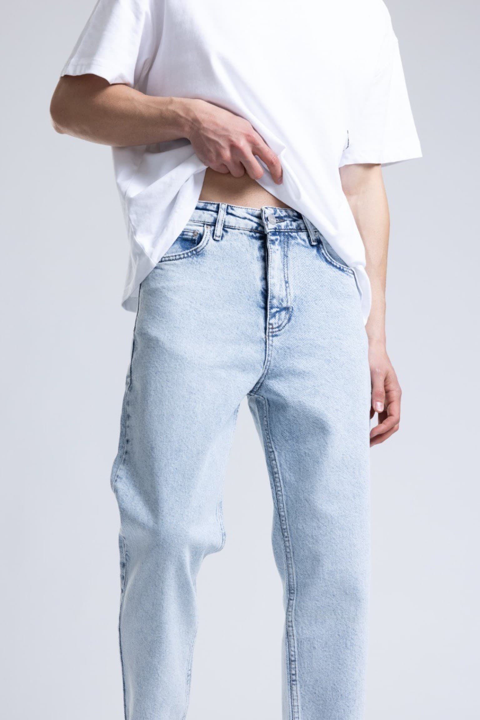 Lightblue Wash Denim Boyfriend Jeans - Light wash denim jeans featuring a clean straight-leg fit with a relaxed everyday silhouette. Designed with a classic five-pocket style, soft faded finish, and comfortable mid-rise waist for effortless wear. Easy to style with tees, hoodies, or sneakers for a fresh modern casual look.