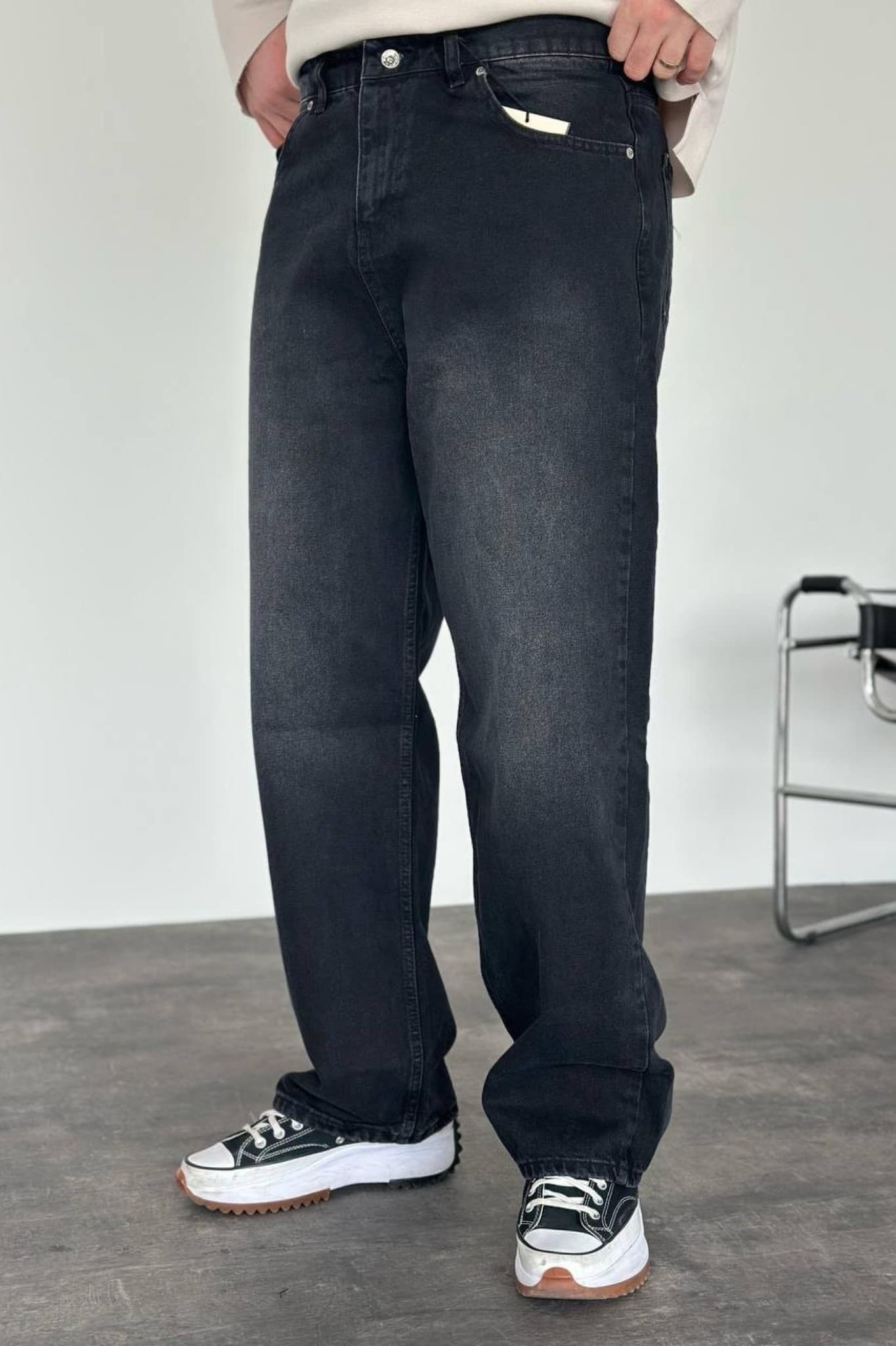Faded Washed Black Baggy Jeans - Dark Washed Baggy Jeans – a clean everyday essential with relaxed streetwear style. Crafted in a deep faded black wash, these jeans feature a loose wide-leg fit for maximum comfort and effortless movement. Designed with classic five-pocket styling, sturdy denim fabric, and a timeless oversized silhouette that pairs perfectly with hoodies, sweaters, or sneakers. A versatile piece made for casual looks with a bold modern edge.