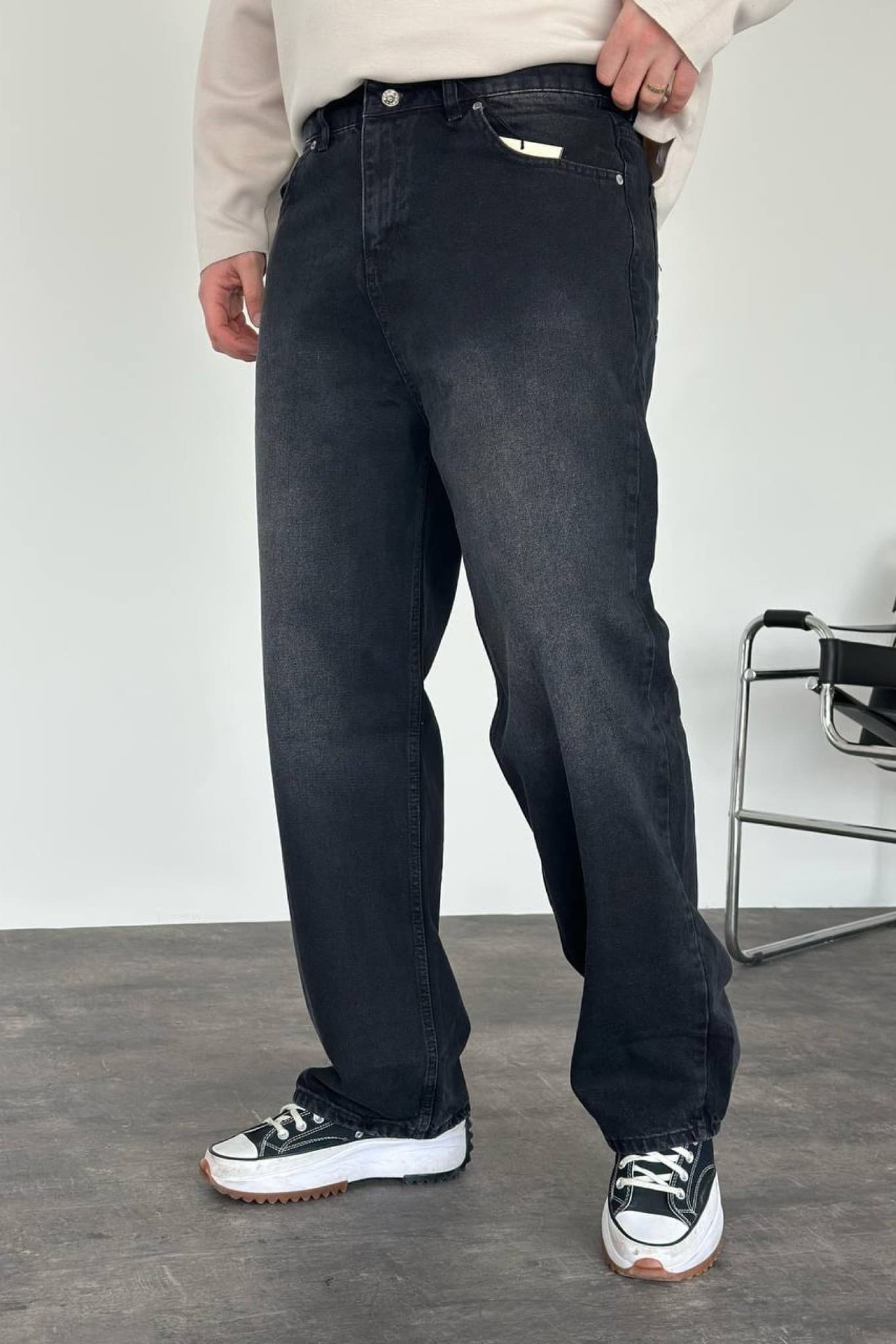 Faded Washed Black Baggy Jeans - Dark Washed Baggy Jeans – a clean everyday essential with relaxed streetwear style. Crafted in a deep faded black wash, these jeans feature a loose wide-leg fit for maximum comfort and effortless movement. Designed with classic five-pocket styling, sturdy denim fabric, and a timeless oversized silhouette that pairs perfectly with hoodies, sweaters, or sneakers. A versatile piece made for casual looks with a bold modern edge.