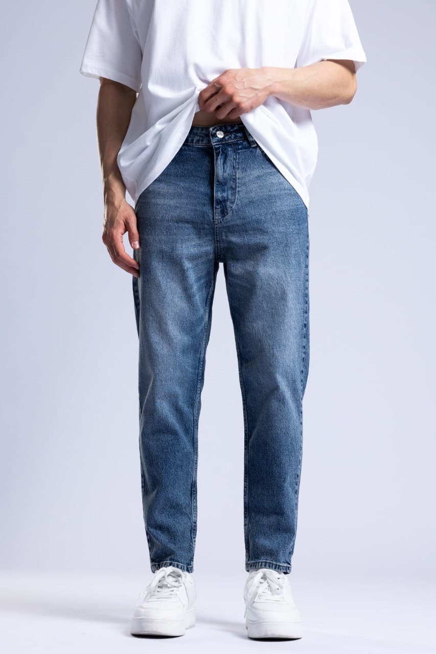 Classic Blue Wash Denim Boyfriend Jeans - Classic blue wash denim jeans crafted with a slim straight fit for a clean modern look. Features a soft faded finish, mid-rise waist, and timeless five-pocket design for everyday comfort and style. Perfect to pair with oversized tees, shirts, or sneakers for an effortless casual outfit.