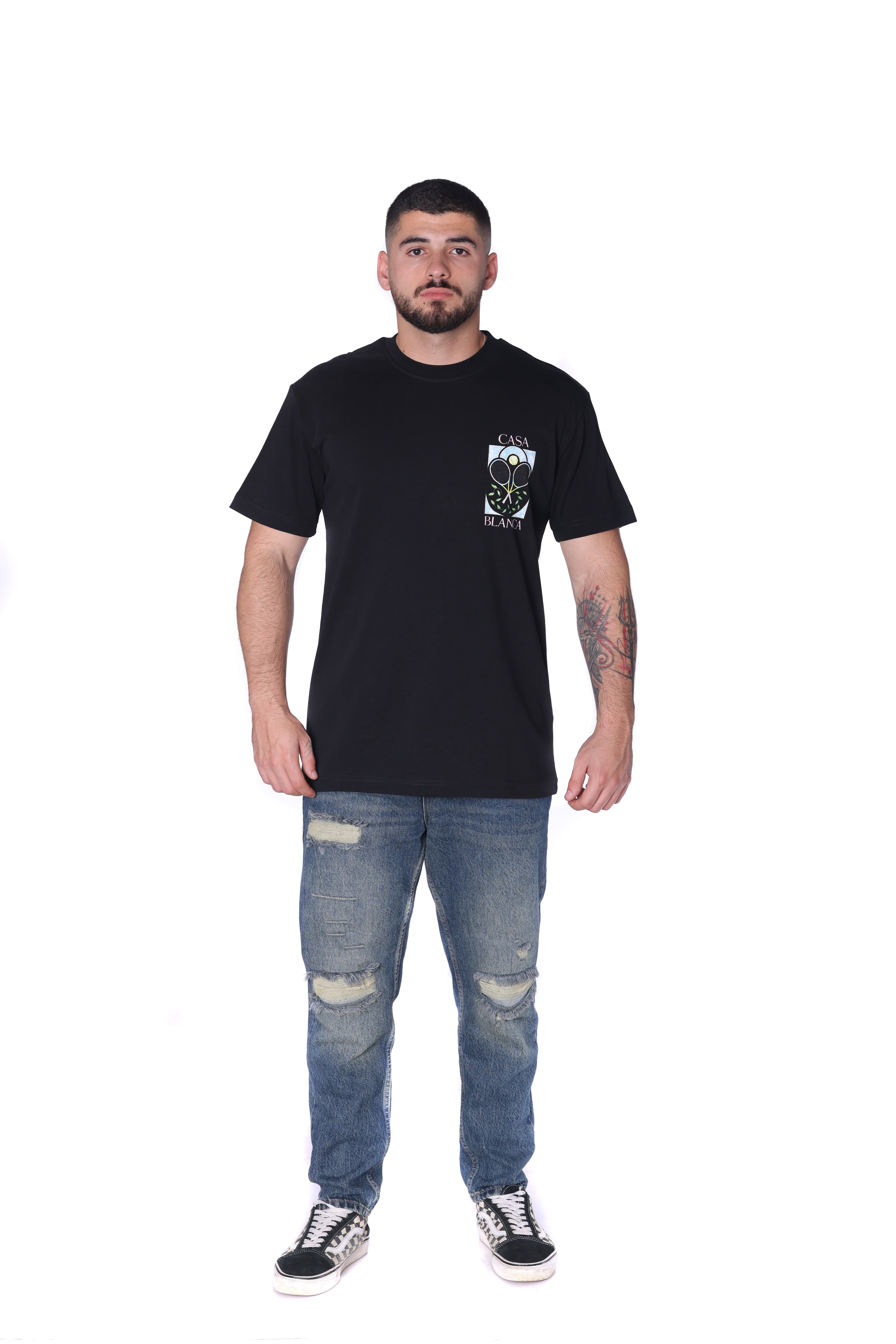 Black Oversized T-Shirt Casa Blanca Tennis - BLACK oversized t-shirt featuring a subtle front chest graphic and bold Casa Blanca-inspired artwork on the back with tennis racket design details. Made from soft breathable fabric with a relaxed fit for all-day comfort. A fresh premium streetwear piece perfect for casual summer looks and everyday styling.