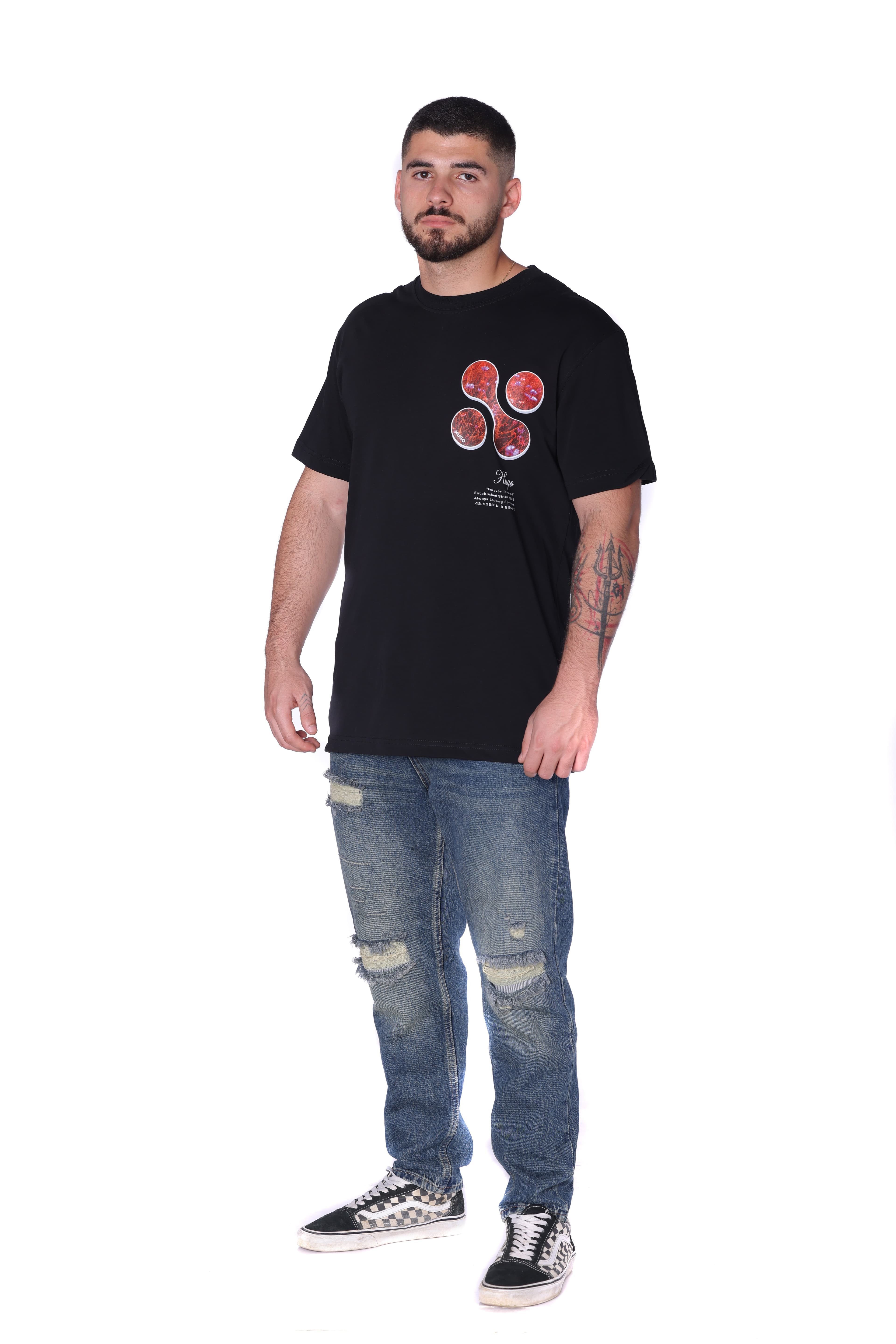 Black Oversized Forever Inspired T-Shirt Hugo Boss - Black oversized t-shirt featuring a subtle front chest graphic and bold abstract floral artwork on the back. Crafted from soft breathable fabric with a relaxed fit for all-day comfort. A clean statement streetwear piece perfect for casual styling, layered looks, and everyday wear.