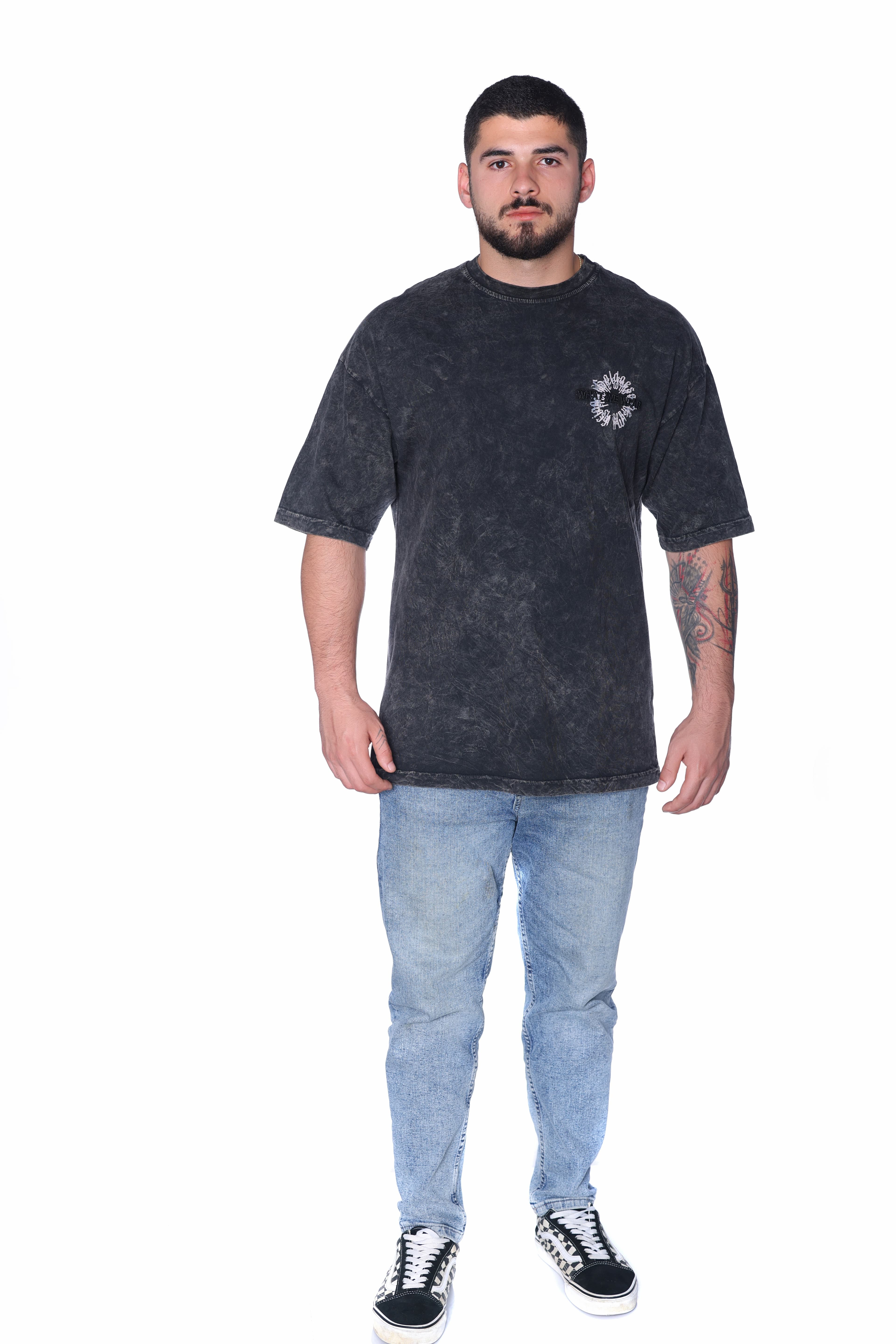 Vintage Charcoal Washed T-Shirt Oversized - Oversized washed black t-shirt featuring a subtle front chest graphic and bold gothic statement artwork on the back with raised What We Wear text detail. Crafted from soft premium fabric with a vintage faded finish and relaxed fit for all-day comfort. A standout streetwear essential perfect for edgy casual looks, layered outfits, and everyday wear.