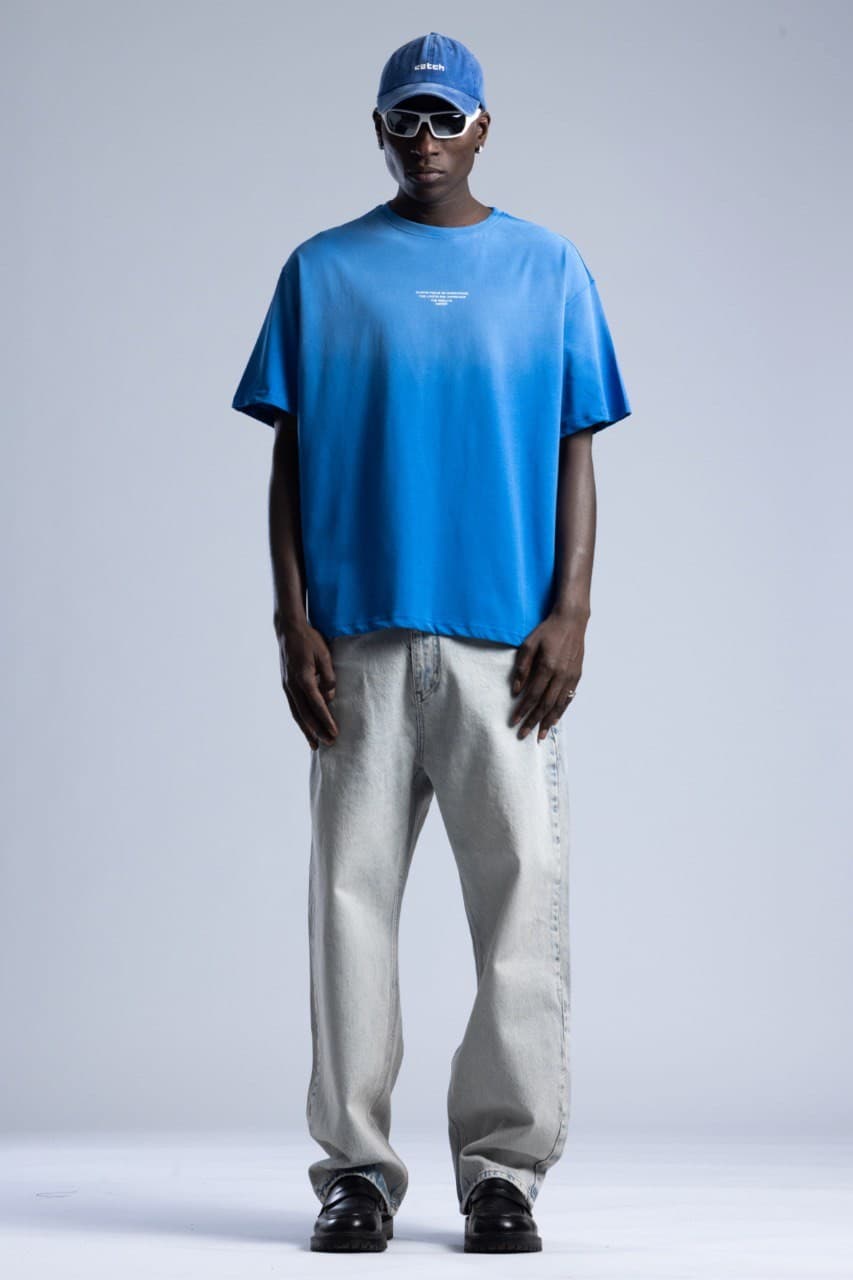 Oversized Electric Blue T-Shirt - Oversized fit t-shirt in a bold electric blue finish, designed with a clean minimal front detail for a modern streetwear look. Crafted from soft premium cotton with a relaxed drop-shoulder silhouette for all-day comfort. Easy to style with denim, cargos, or sneakers for a fresh everyday outfit.