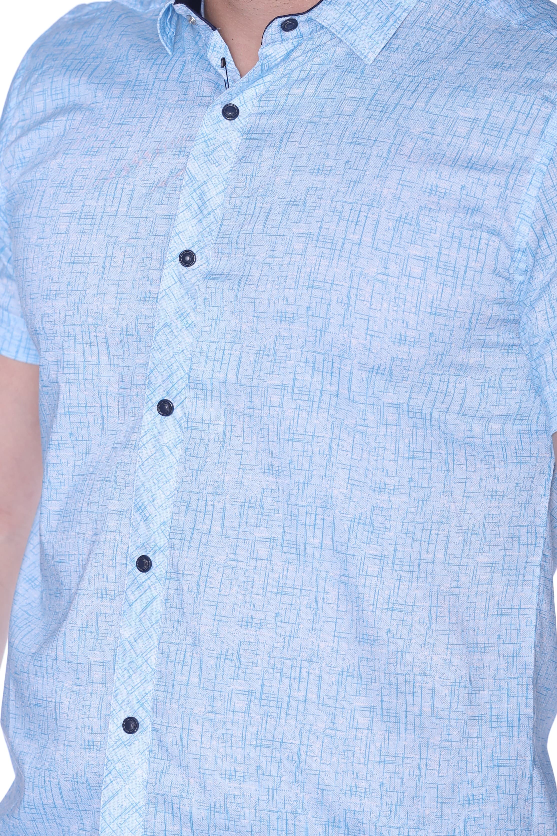 Slim-Fit Light Blue Button-Down Shirt - Slim-fit short sleeve button-down shirt in a fresh light blue tone, featuring a subtle textured pattern for a clean and modern look. Designed with a sharp collar and contrasting dark buttons for added detail. Crafted from lightweight, breathable fabric that ensures comfort while maintaining a sleek silhouette—perfect for smart-casual outfits or polished everyday wear.
