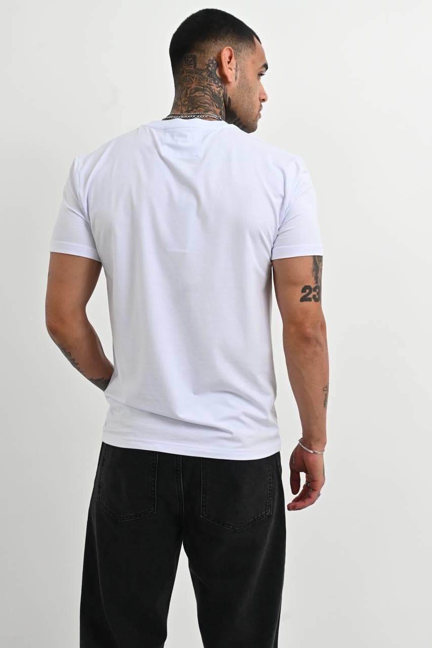 Classic White Premium Tee - Classic white premium tee with a clean minimal design and sleek chest emblem detail. Crafted with a smooth soft-touch fabric and a fitted cut that gives a sharp modern look. Easy to style for both streetwear and casual outfits, whether layered or worn on its own. Timeless, versatile, and made for an everyday luxury vibe.