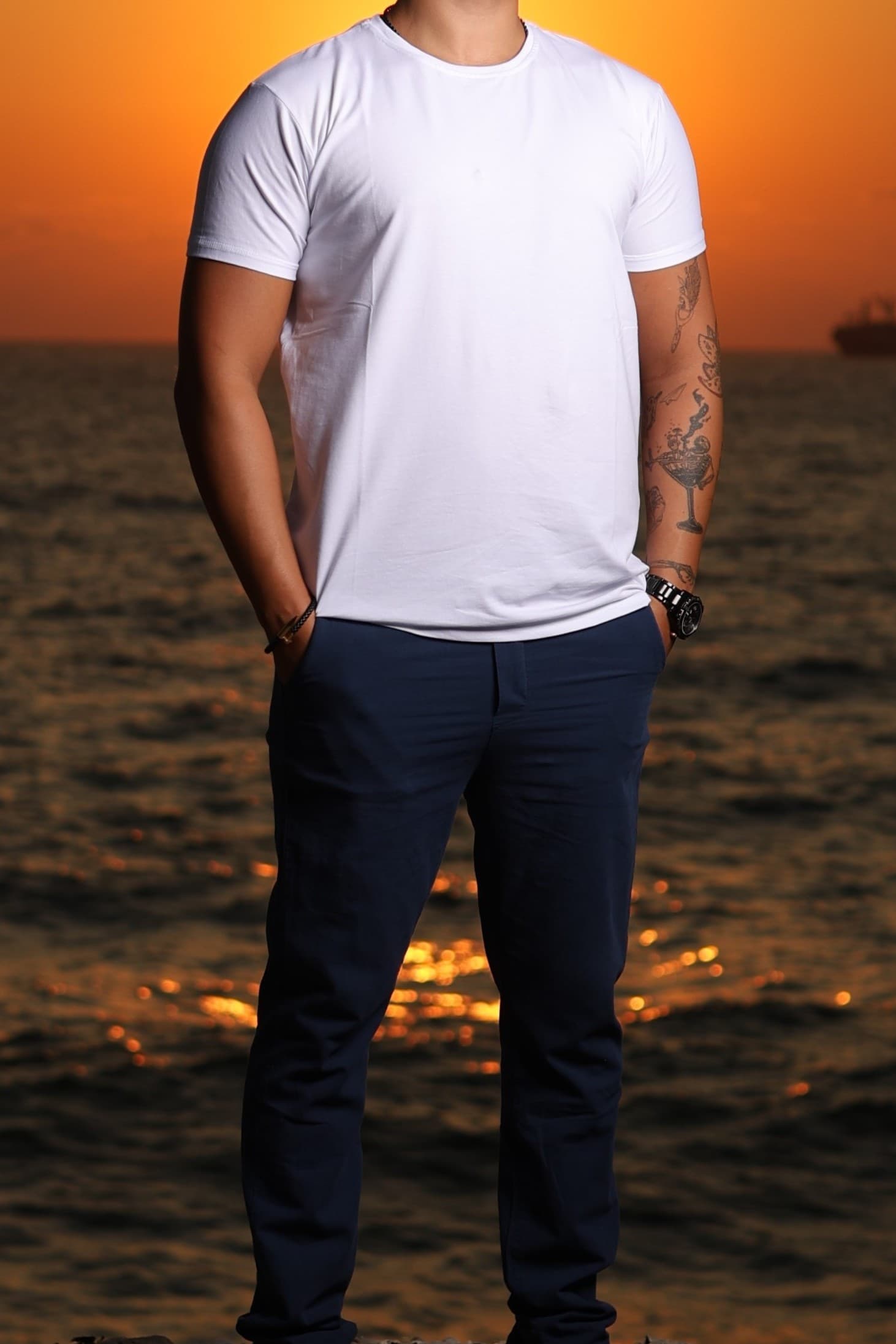 Clean White Essential T-Shirt - Clean white essential t-shirt with a modern slim fit and minimalist look. Designed with soft lightweight fabric for all-day comfort and effortless styling. The crisp white tone gives a fresh premium feel, perfect for casual outfits, summer nights, or layered streetwear looks. Simple, versatile, and timeless for everyday wear.