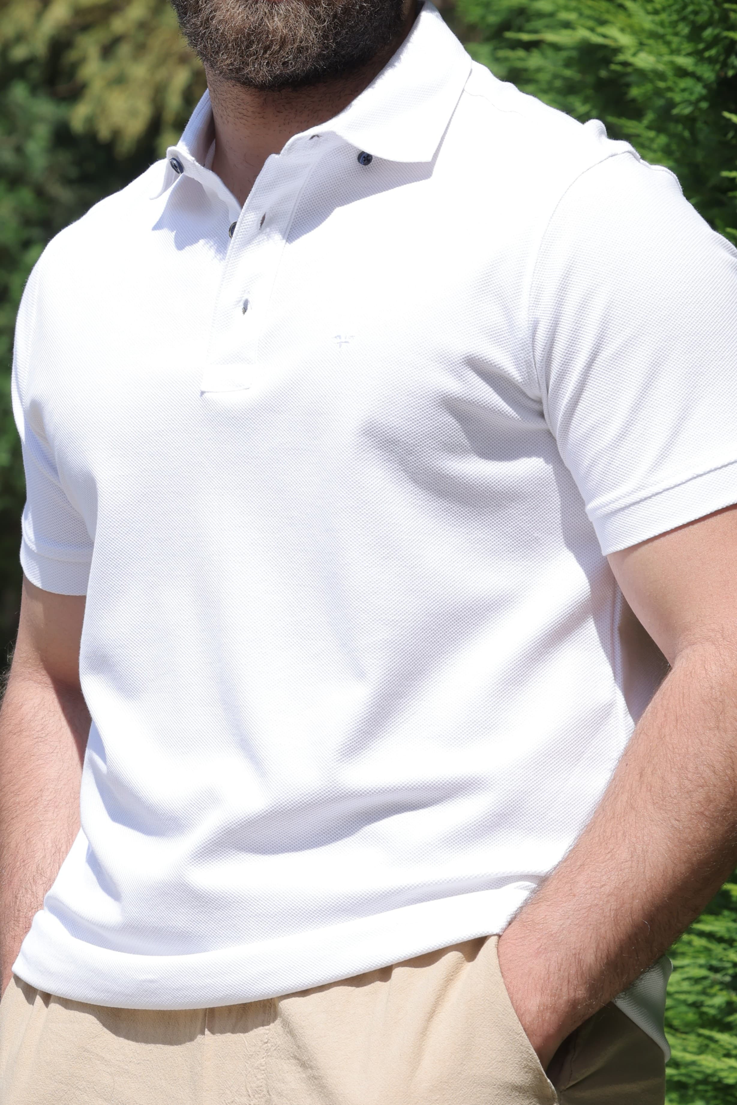 Classic Piqué Polo - Classic Piqué Polo

A timeless essential designed for effortless everyday style. Crafted from premium breathable piqué cotton, this polo delivers all-day comfort with a clean, structured look. Featuring a classic collar, two-button placket, and a tailored fit, it offers the perfect balance between casual and refined. Whether paired with shorts for a relaxed weekend outfit or chinos for a smart-casual look, this versatile polo is a wardrobe staple built to last.

Details:

* Premium breathable piqué cotton fabric
* Classic polo collar with two-button placket
* Tailored fit for a clean silhouette
* Soft, lightweight, and comfortable
* Durable construction for everyday wear
* Easy to pair with shorts, chinos, or jeans
* Ideal for casual and smart-casual occasions